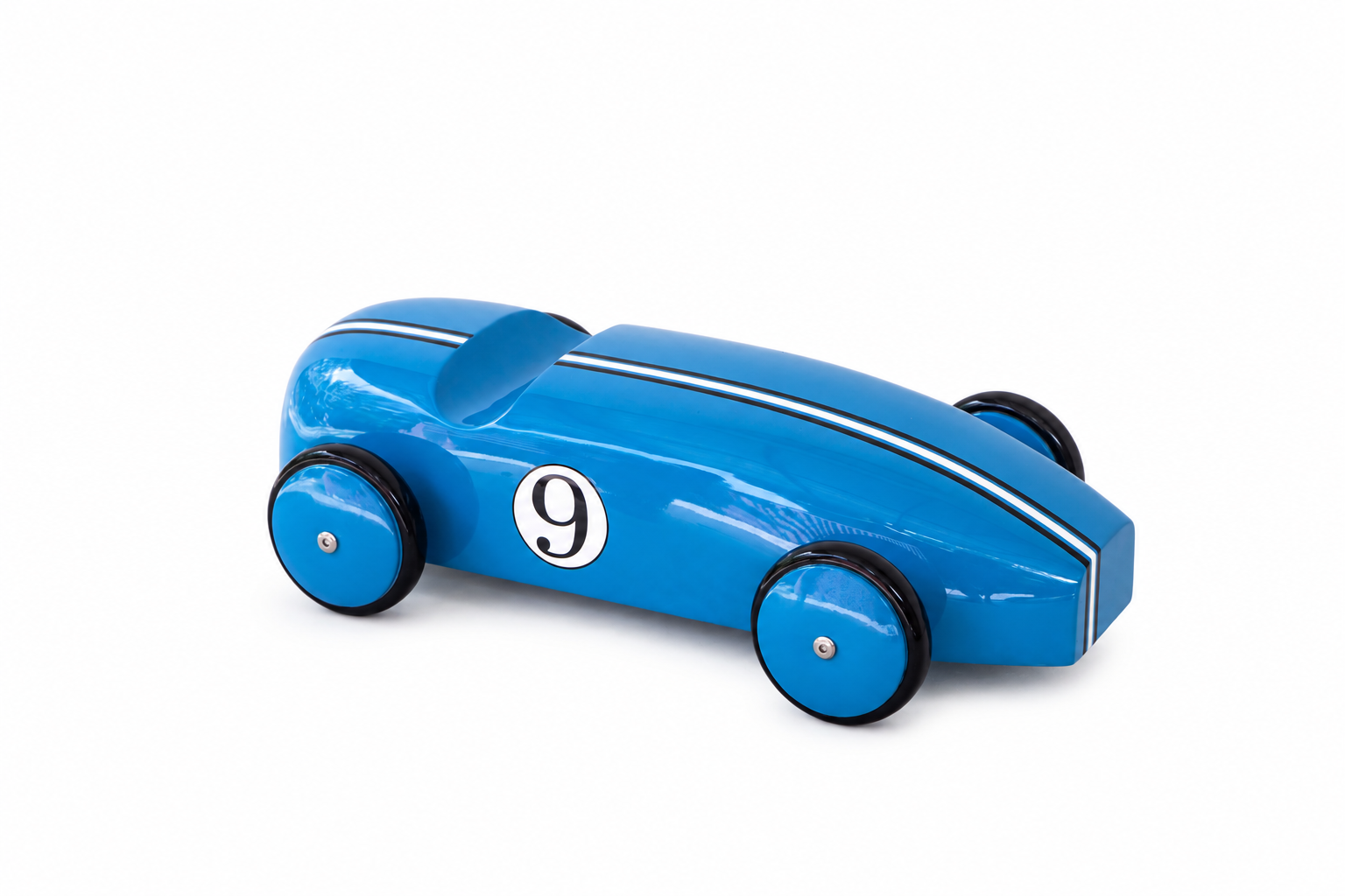 Blue lacquered teak race car