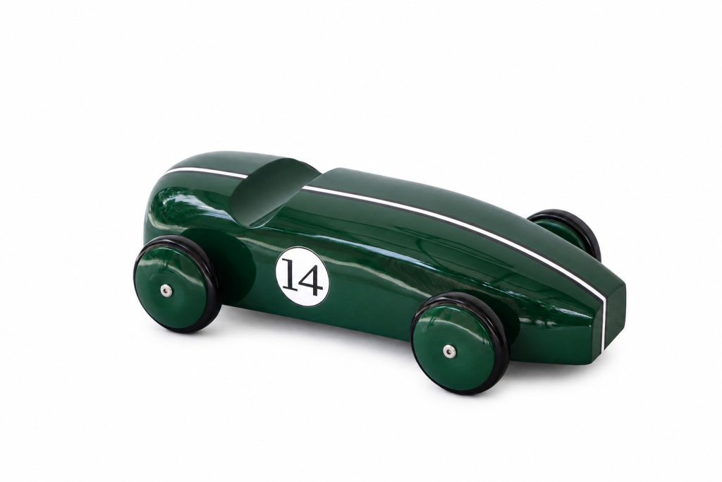 Green lacquered teak race car