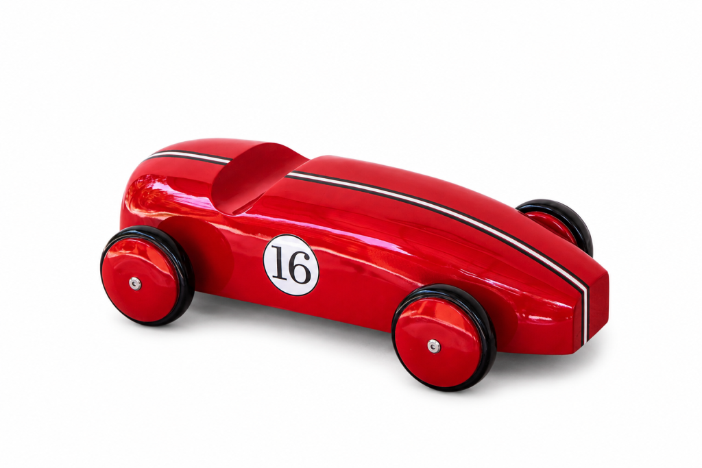 Red lacquered teak race car