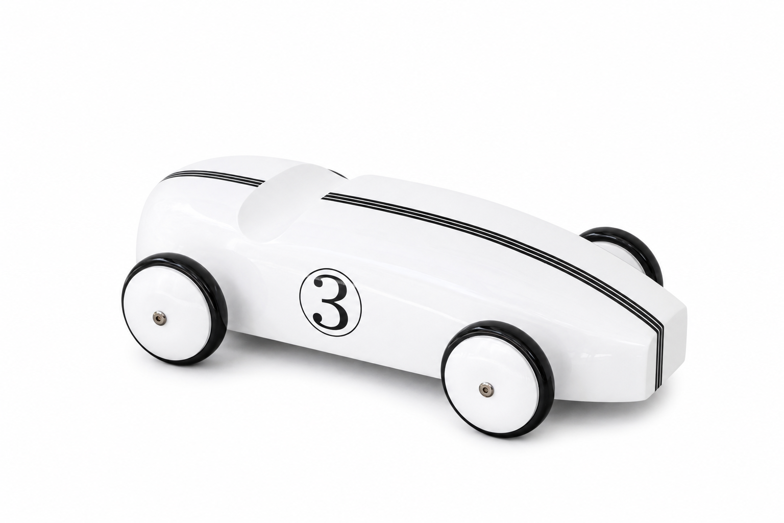 White lacquered teak race car